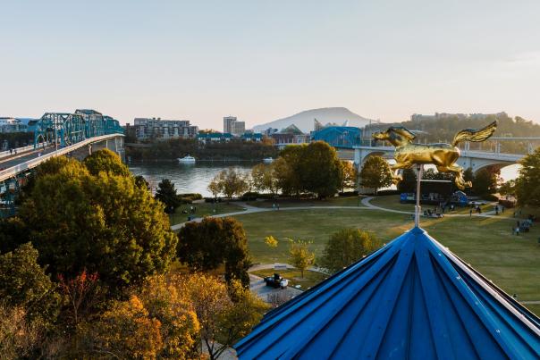 Aerial of walnut street pedestrian bridge, coolidge park and carousel in the fall