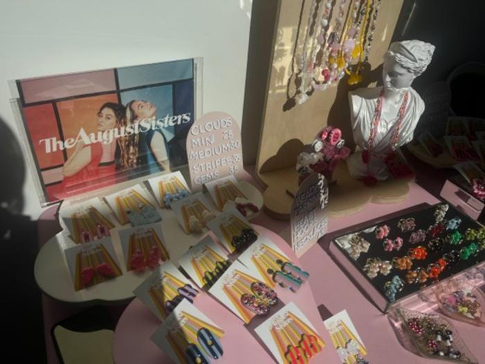 The August Sisters’ jewelry collection available at a pop-up KaitMakes market.