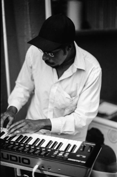 Local musician Tryezz plays keyboard